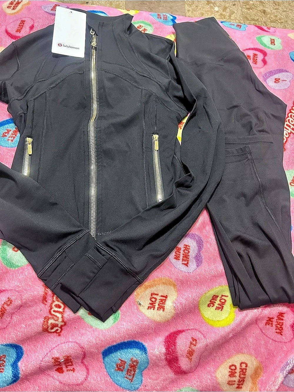 Black Lululemon cropped define nulu woman set